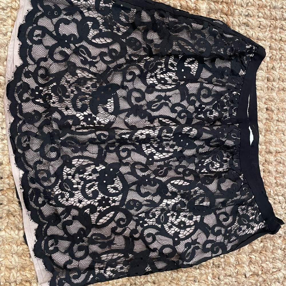 Ann Taylor Loft black lace mini skirt, size 2.